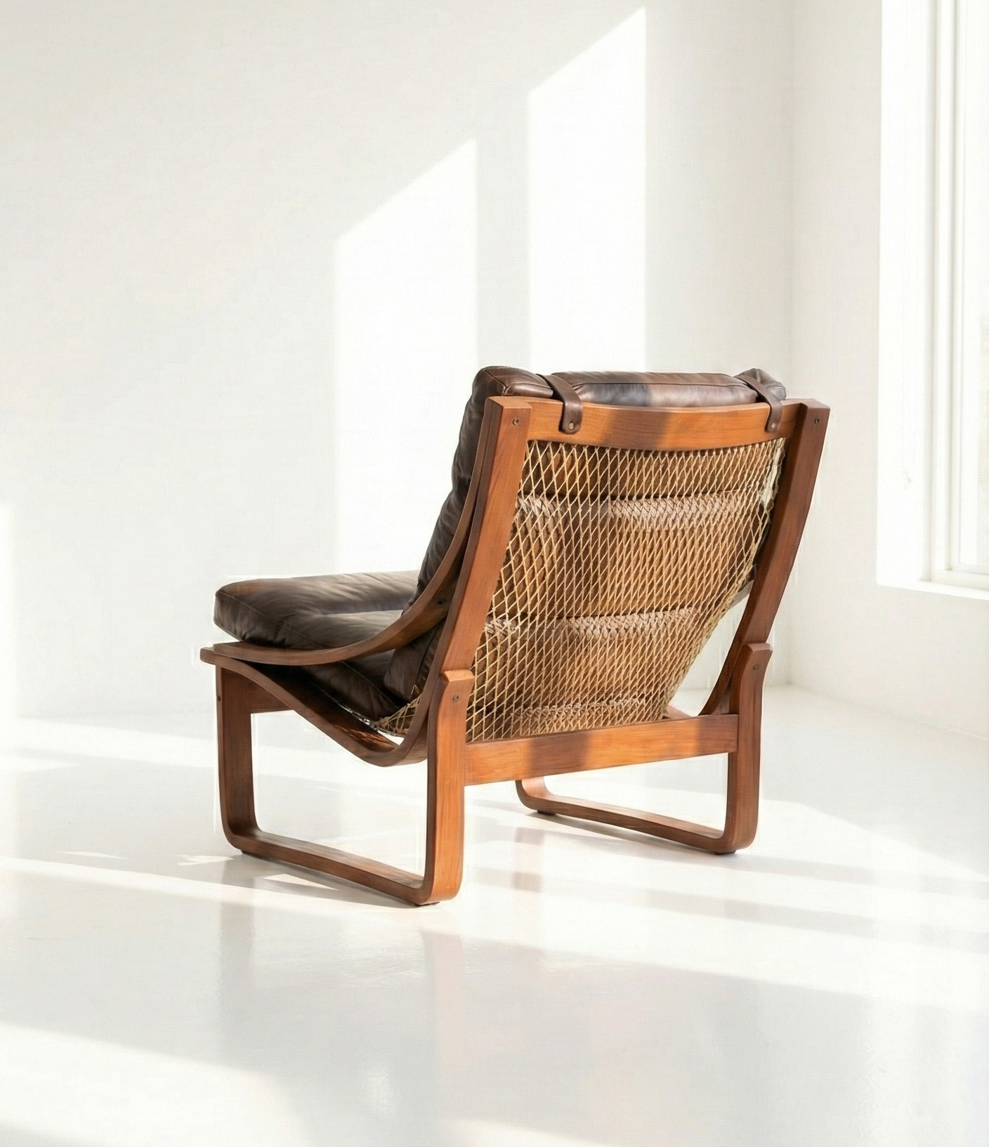 Mid Century Tessa T4 Sling brown leather armchair seat chair