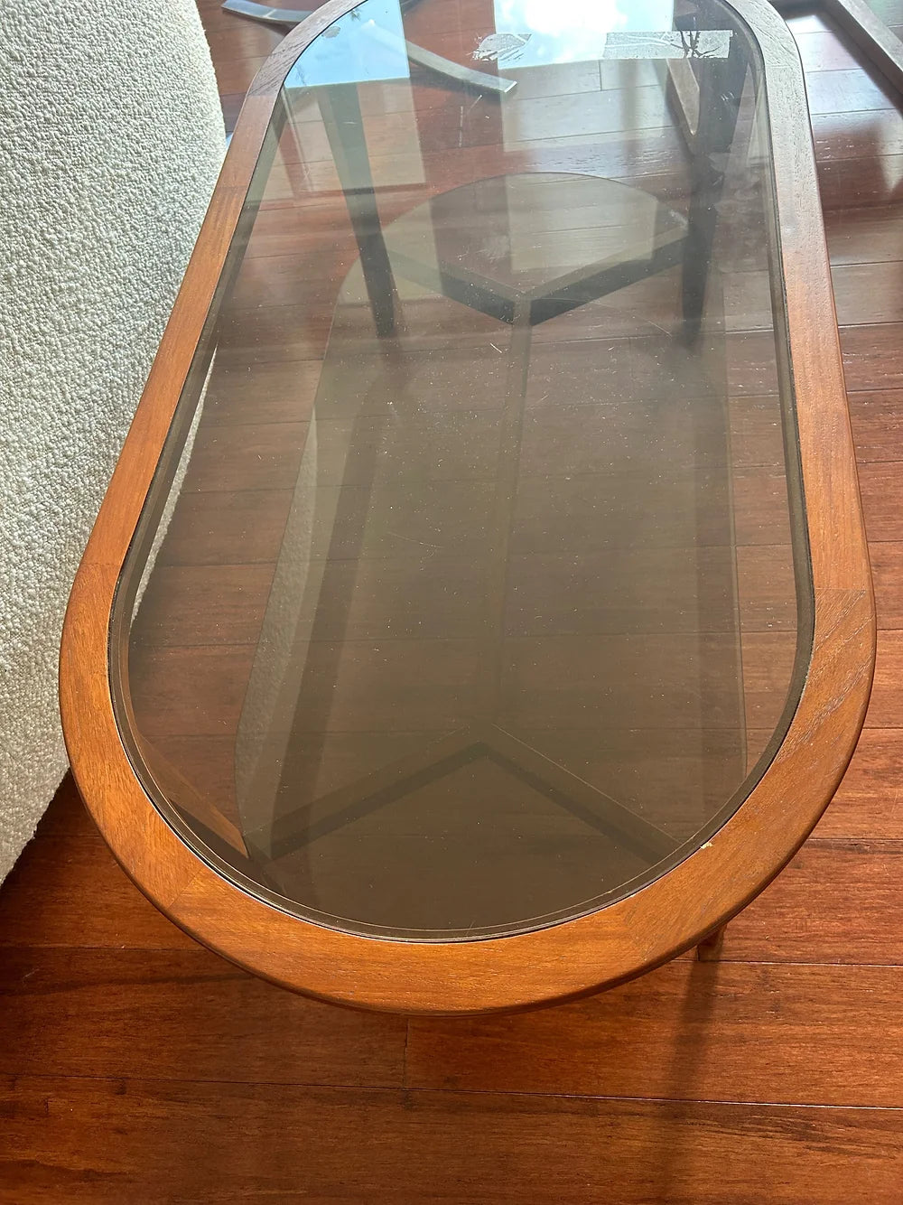 Chiswell Teak And Smoked Glass Oval Coffee Table