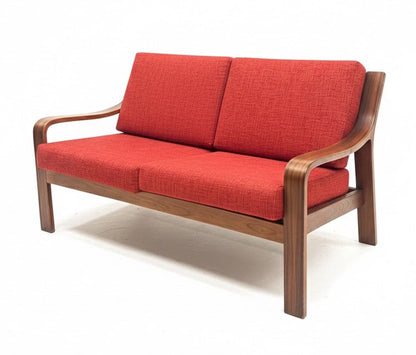 Mid Century Tessa Two seater lounge in walnut with new red upholstery