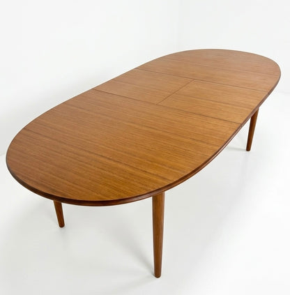 Mid Century Chiswell Nordic teak oval table with extension heat resistant top