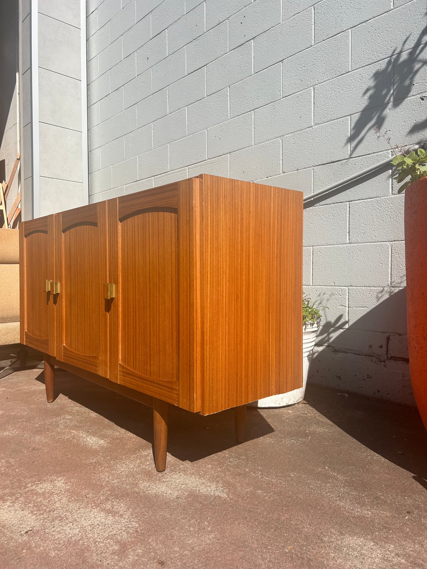 Mid Century golden teak sideboard buffet storage cabinet