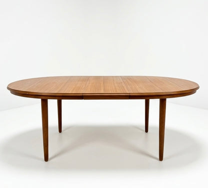 Mid Century Chiswell Nordic teak oval table with extension heat resistant top