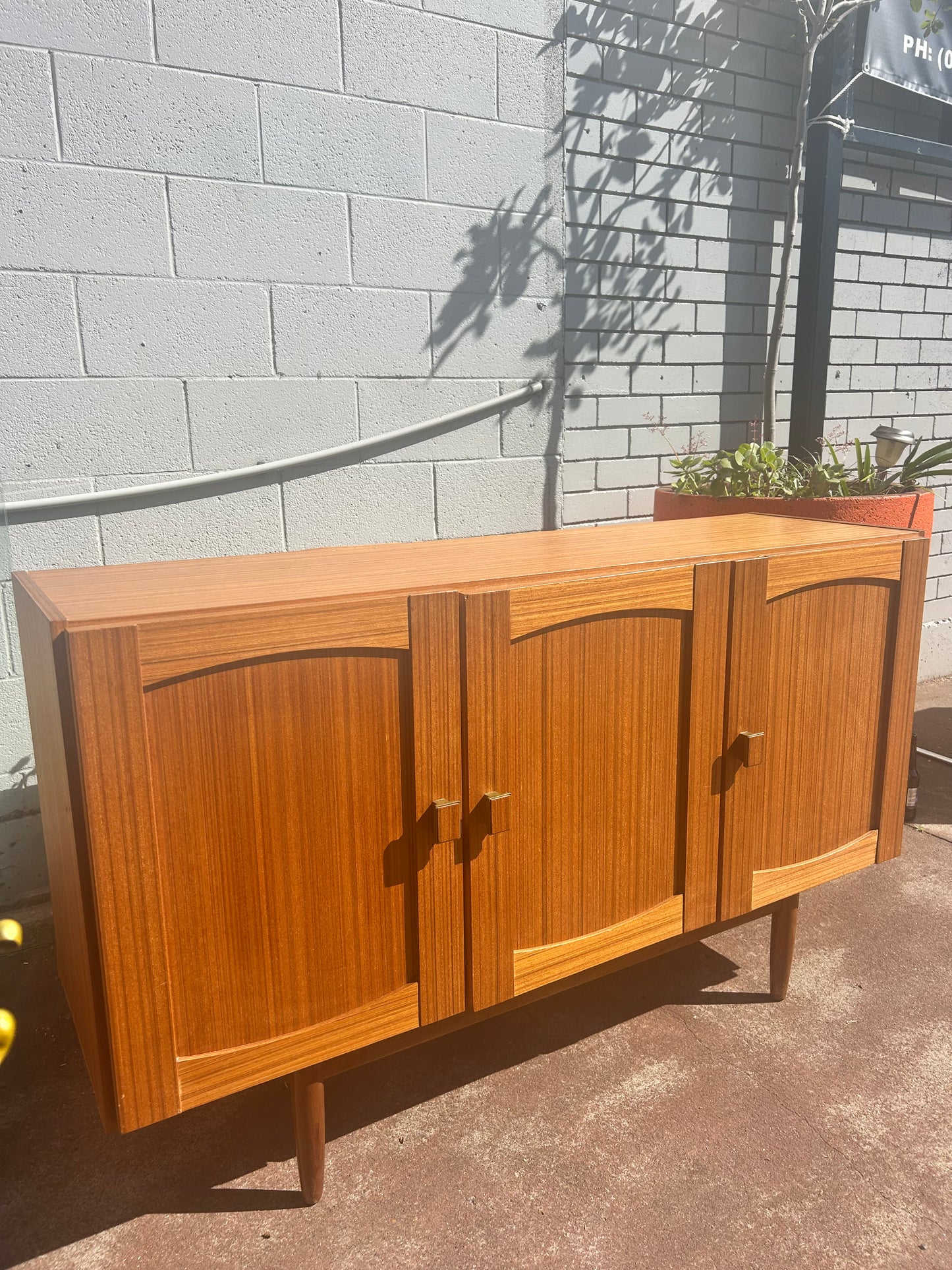 Mid Century golden teak sideboard buffet storage cabinet
