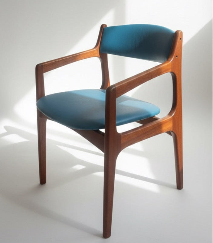 Danish Otto Larsen teak armchair with new warwich commercial grade vinyl in blue