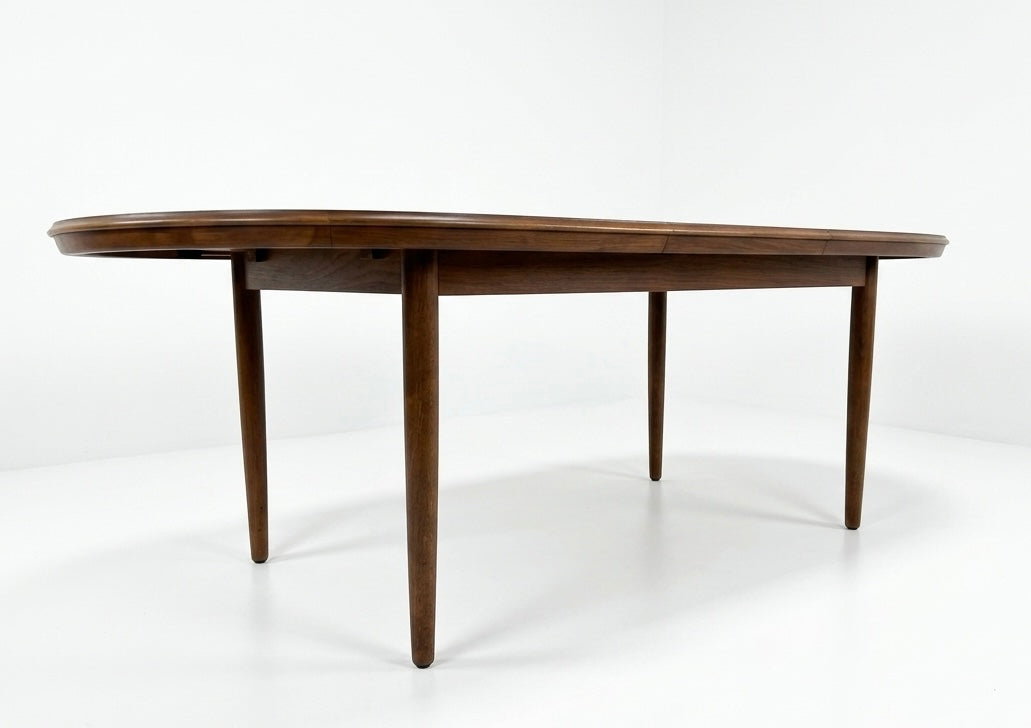 Mid Century Chiswell Nordic teak oval table with extension heat resistant top