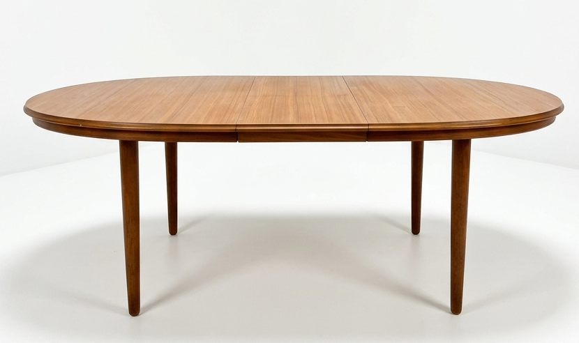 Mid Century Chiswell Nordic teak oval table with extension heat resistant top