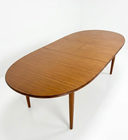 Mid Century Chiswell Nordic teak oval table with extension heat resistant top